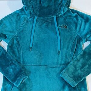 Woman’s North Face turquoise high neck fuzzy hoodie